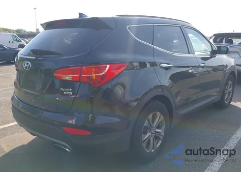 2014 Hyundai Santa Fe Sport 2.4L z USA, uszkodzony, nr VIN 5XYZUDLB8EG231293